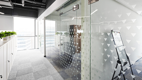 Full-length shot of office floor-to-ceiling windows.