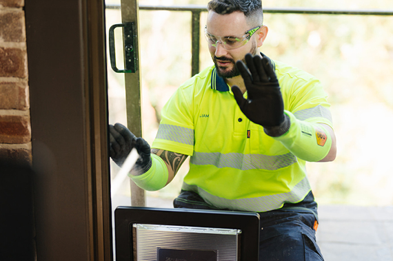 Glazier is installing pet doors