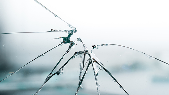 Close-up shot of cracked window glass.