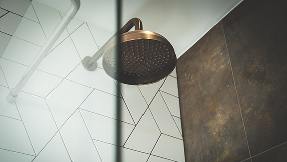 Close-up shot of a stainless steel showerhead.