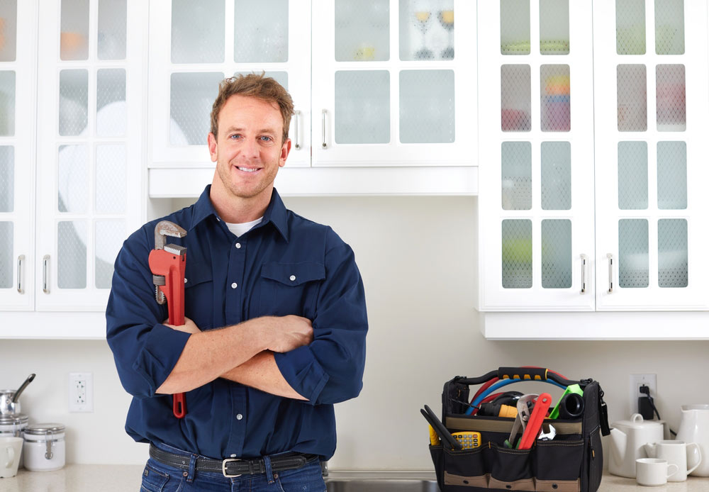 Plumber Holding A Wrench