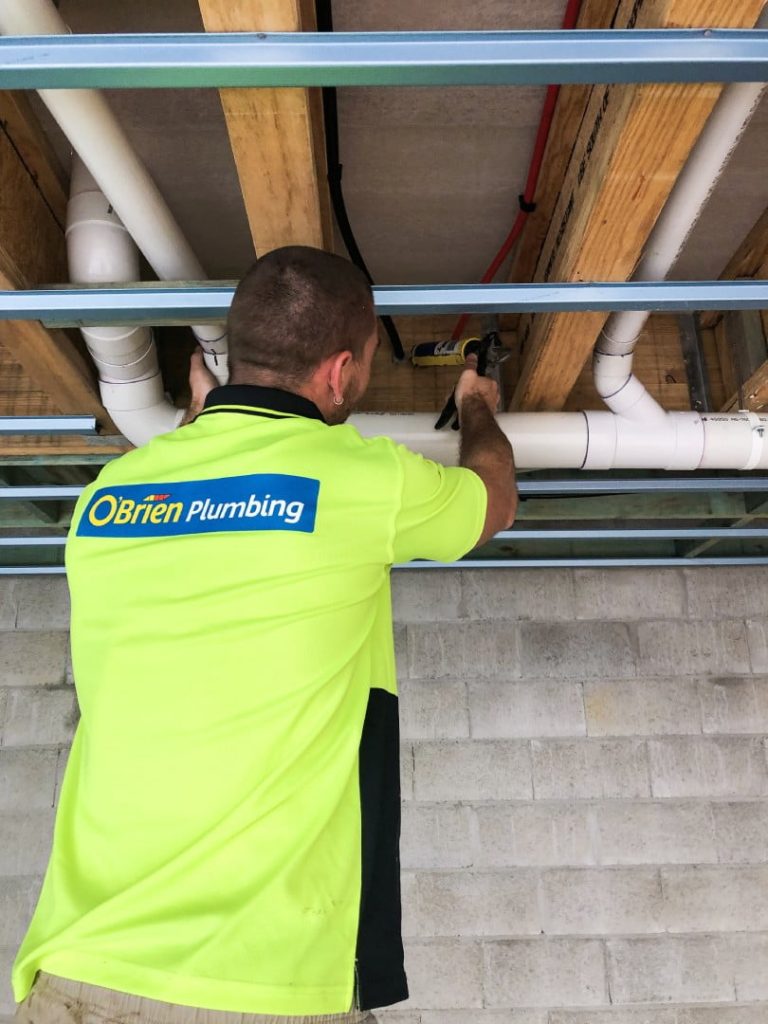 Plumber installing piping in Maroochydore, Sunshine Coast