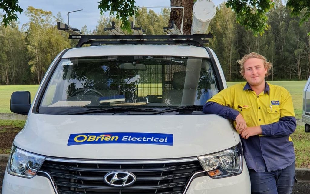 residential electrician next to work van