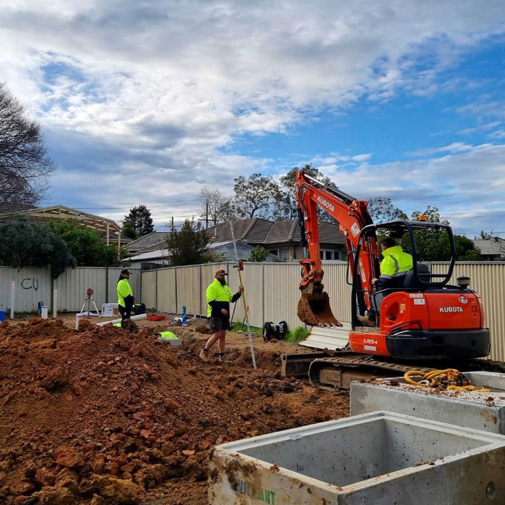 Our plumbing team installing stormwater drainage on a property in Rowville