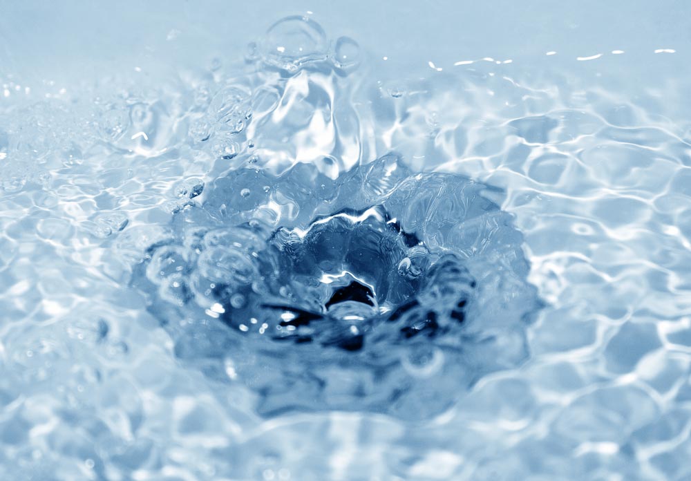 A sink draining after being fixed for a blocked drain