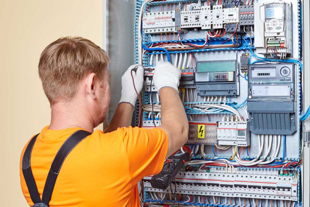 Electrician Checking A Power Cabling