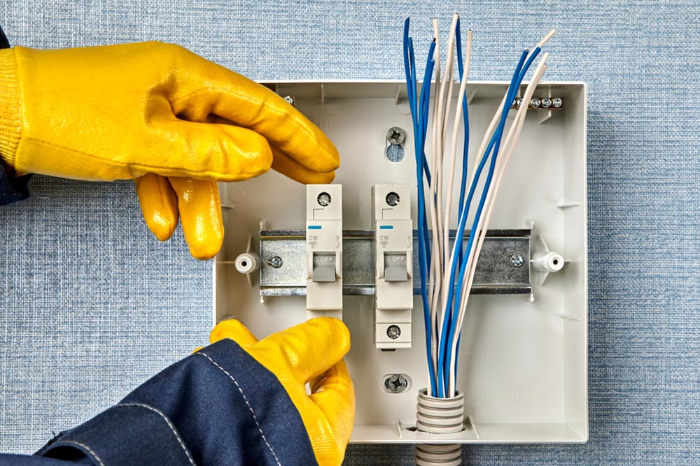 Electrician Rewiring Cables