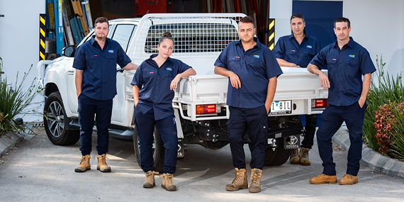 Five O'Brien® staff members standing in front of a work ute.