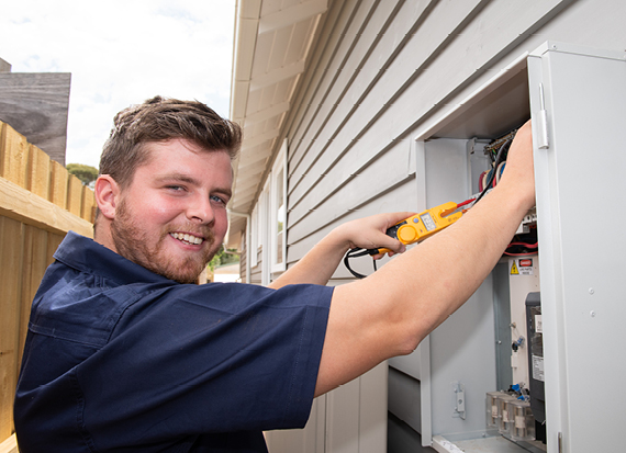 O'Brien® staff member testing an electrical box.