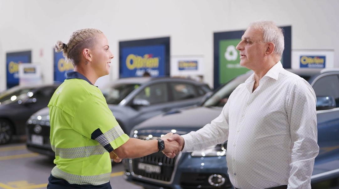 O'Brien® staff member shaking hands with an elderly man